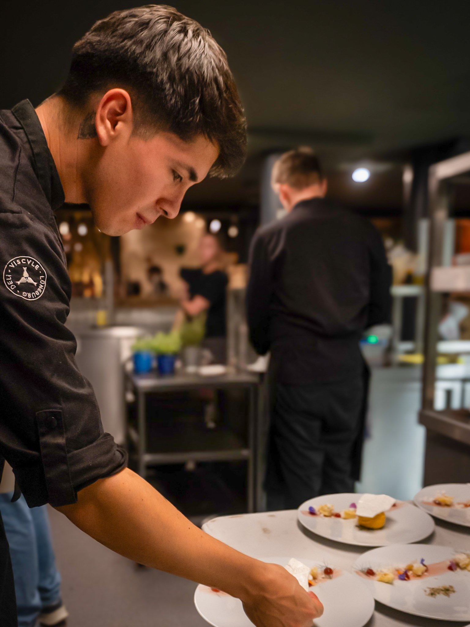 Chef plating a dish